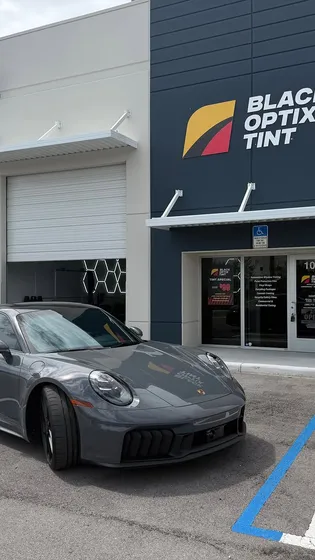 Porsche 911 outside the tint shop